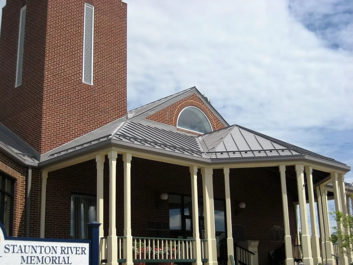 Skilled roofing craftsmen working on a residential roof in Downtown Decatur